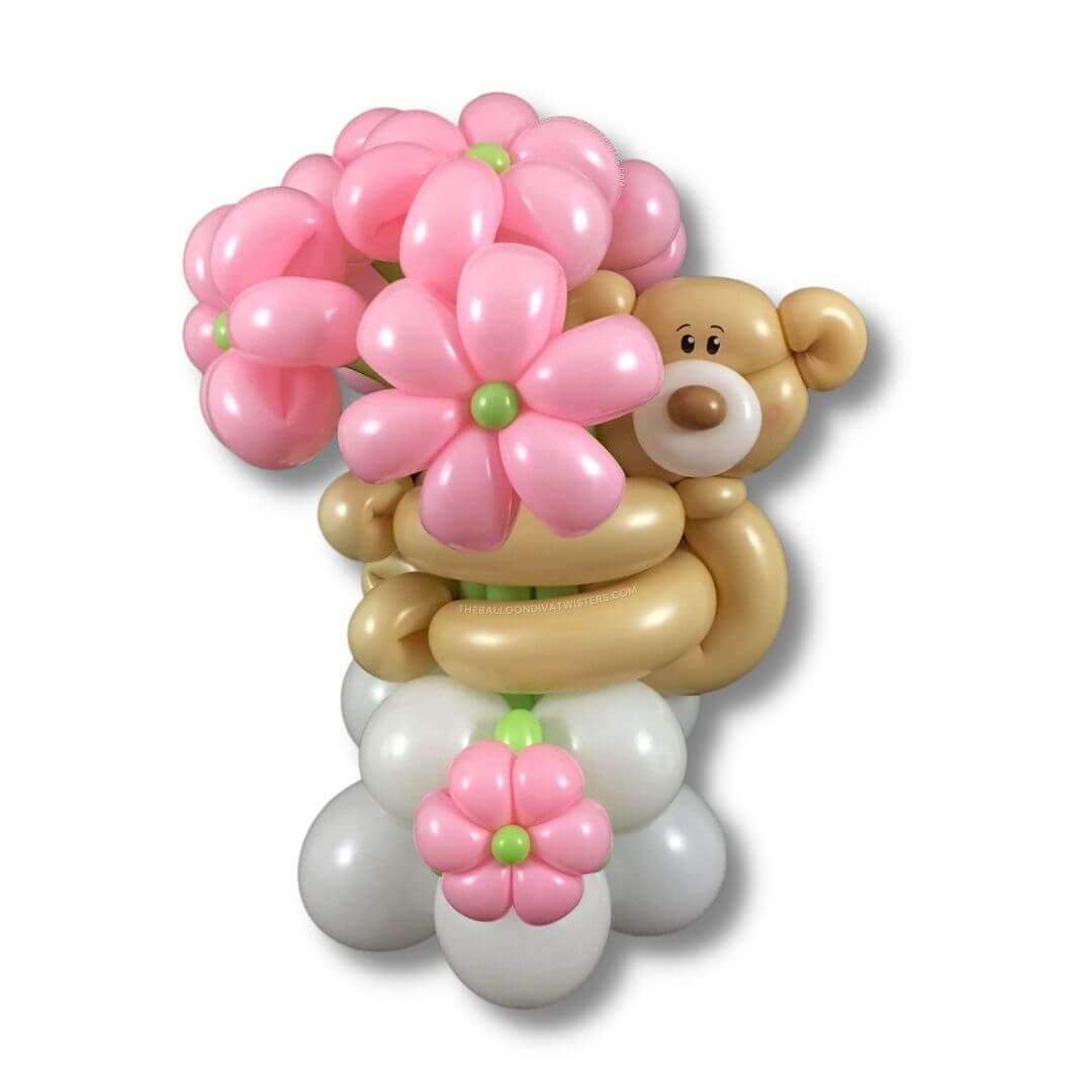Bear Hug Flower Balloon Bouquet features and adorable bear holding pink balloon flowers