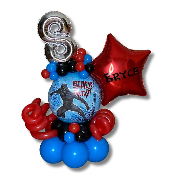 Black Panther Birthday Balloon Marquee features a red personalized star foil balloon, silver number foil balloon, and red, blue, and black balloons.