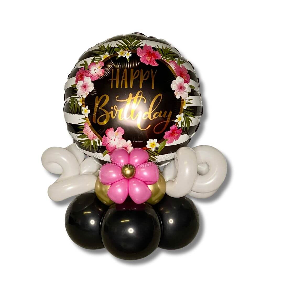 Elegant Tropical Birthday Balloon Centerpiece features black and white stripes, Hawaiian flowers, and gold embellishments