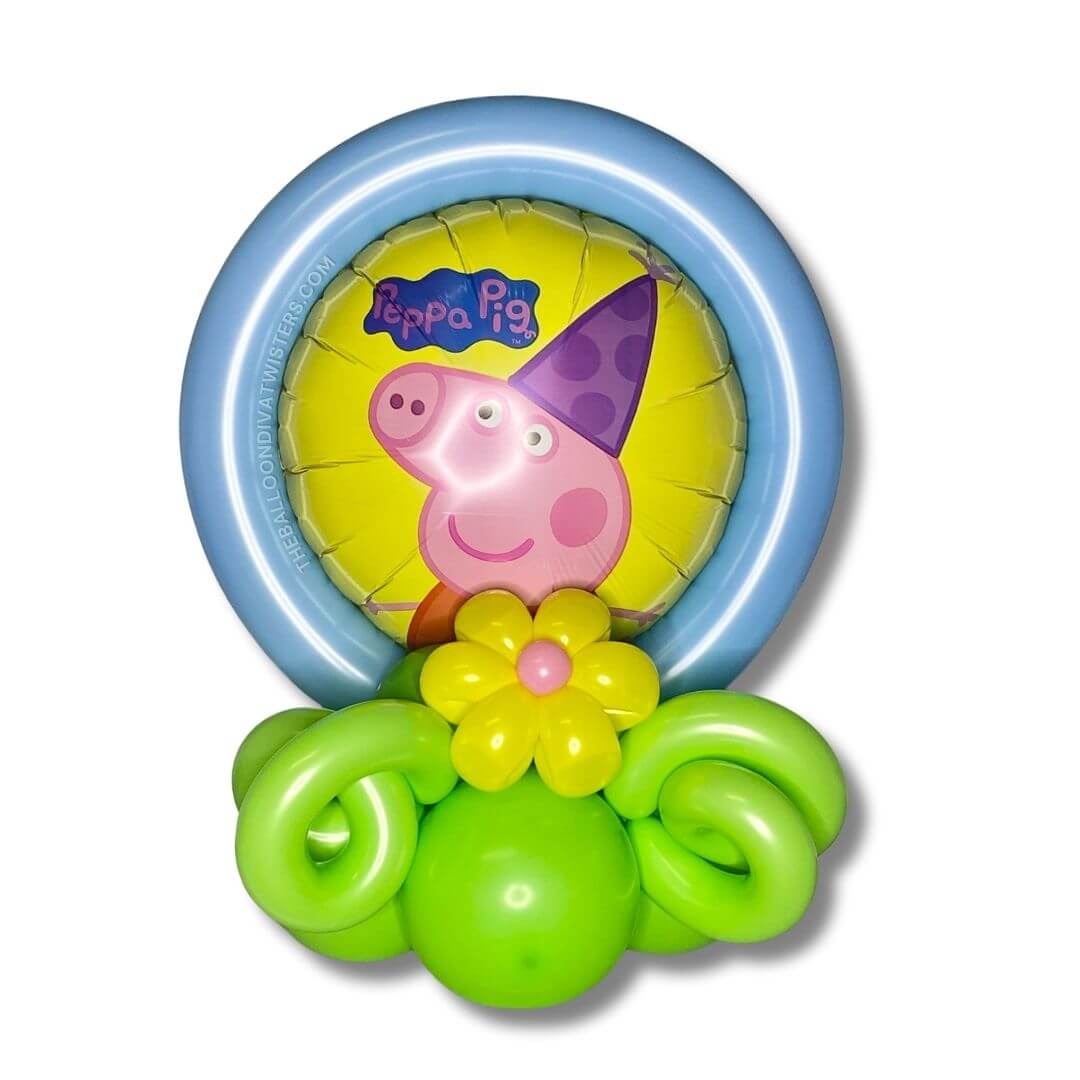 Peppa Pig Birthday Balloon Centerpiece features Peppa, fun balloon curls, and a yellow flower accent.