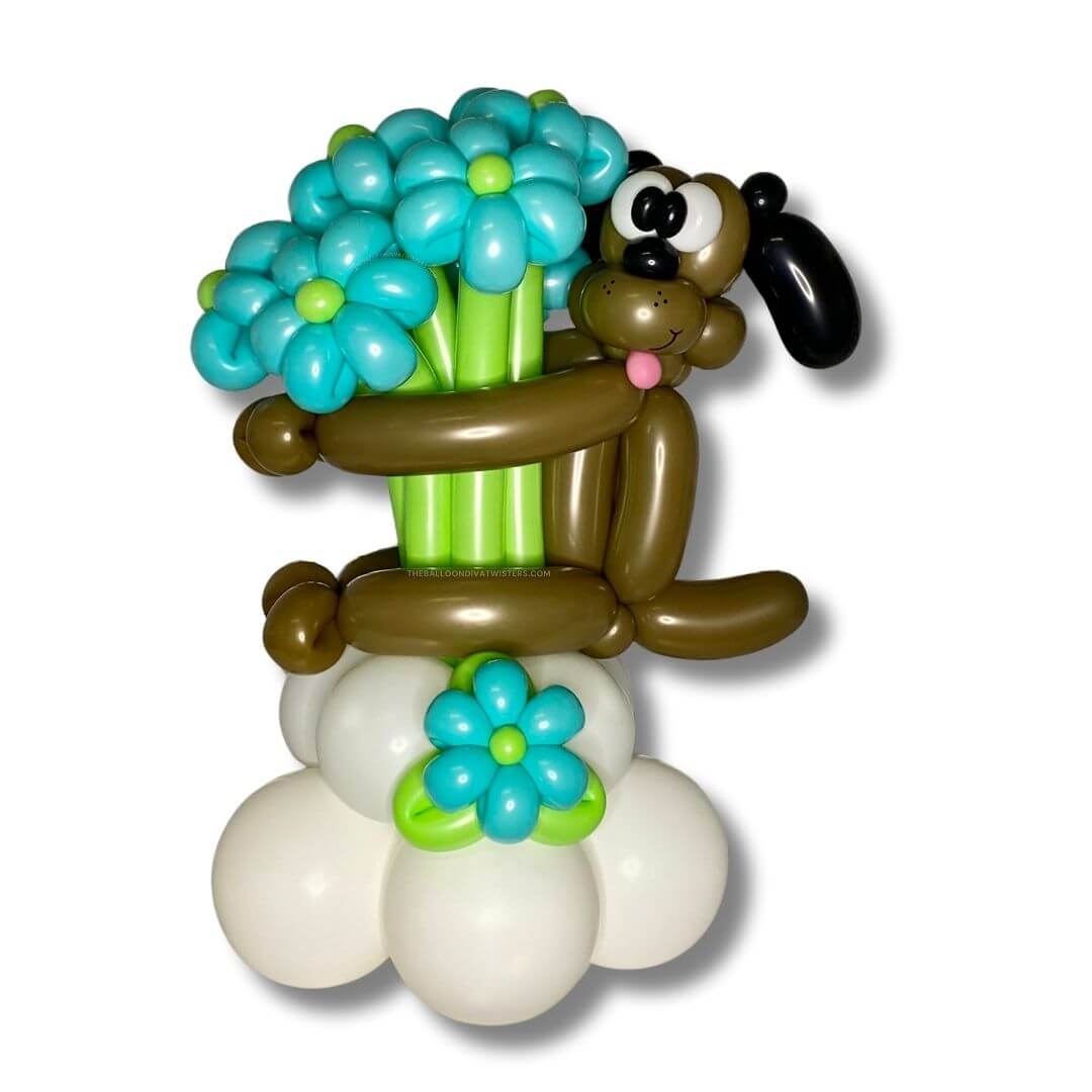 Puppy Hug Flower Balloon Bouquet featuring a cute dog holding a bouquet of blue flowers in a balloon arrangement.