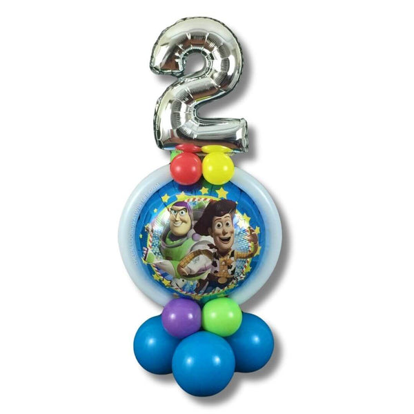 Toy Story Birthday Balloon Marquee features Buzz Lightyear and Woody, along with a 14" silver number foil balloon to announce which birthday your child is celebrating.