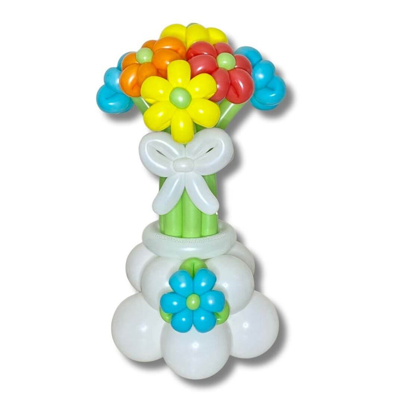 Vacay Vibes Flower Balloon Bouquet features red, yellow, orange, and blue balloon flowers with lime green stems on a white balloon base and a white balloon bow.
